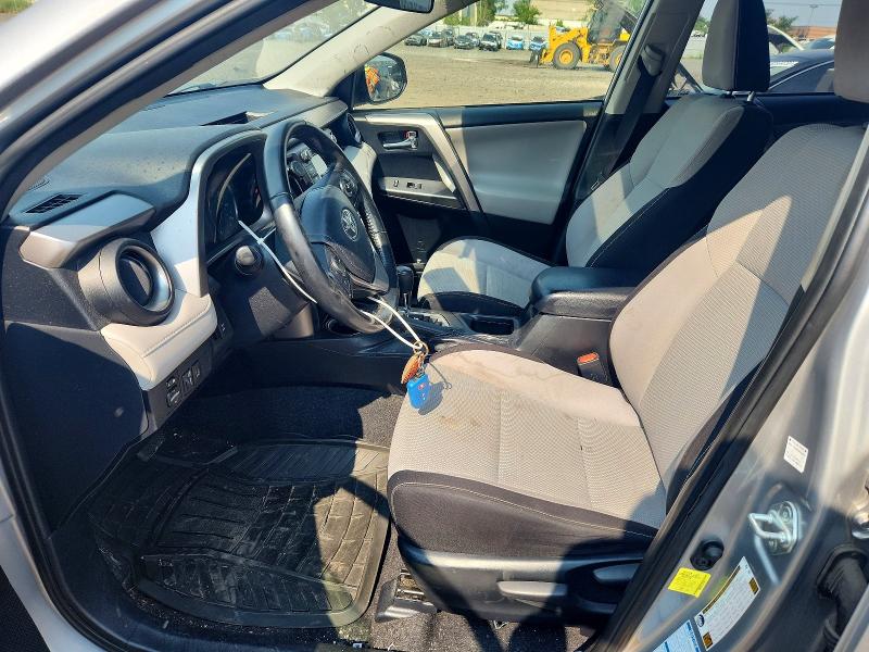 Photo 7 from auction – 2018 TOYOTA RAV4 with VIN JTMRFREV1JJ215882