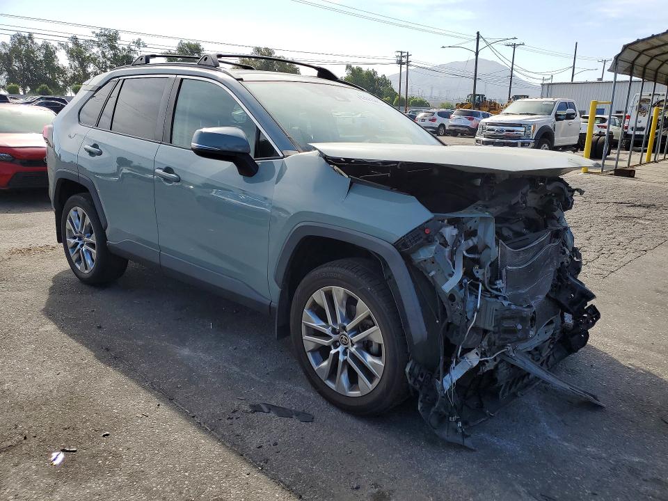 Photo 4 from auction – 2022 TOYOTA RAV4 with VIN 2T3C1RFV4NW213764
