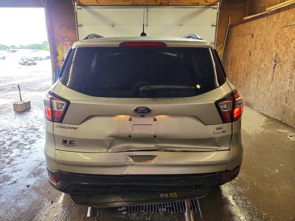 Photo 6 from auction – 2017 FORD ESCAPE with VIN 1FMCU9GD4HUD02230