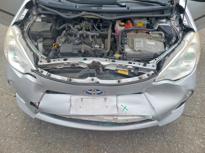Photo 12 from auction – 2012 TOYOTA PRIUS C with VIN JTDKDTB31C1004787