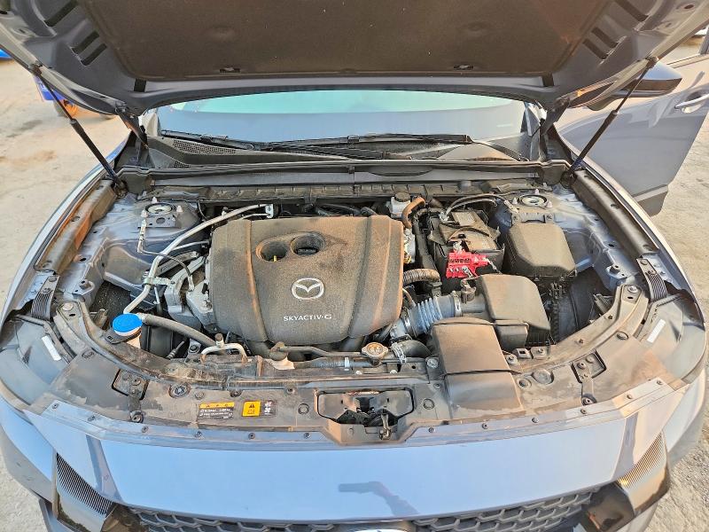 Photo 12 from auction – 2023 MAZDA CX-50 with VIN 7MMVABCM3PN136858