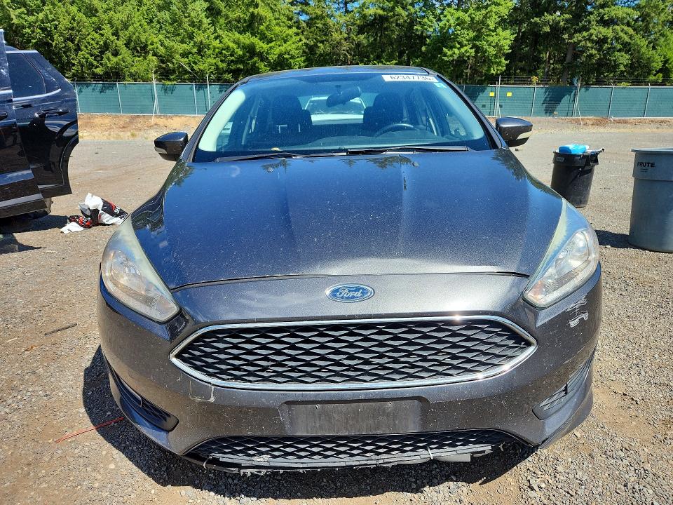 Photo 5 from auction – 2016 FORD FOCUS with VIN 1FADP3F28GL347016