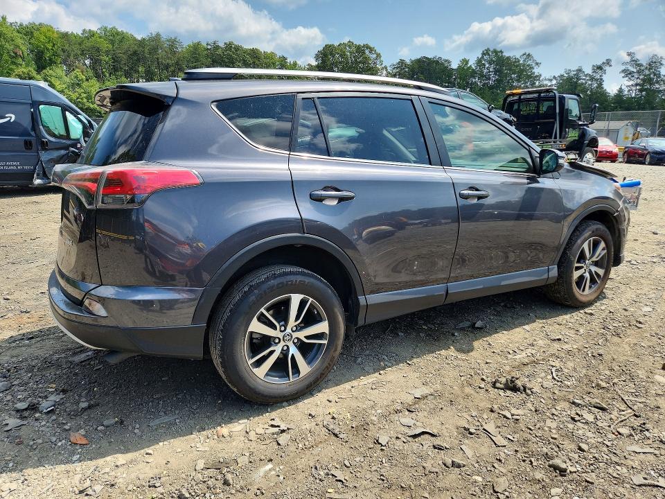 Photo 3 from auction – 2018 TOYOTA RAV4 with VIN JTMWFREV2JJ187528