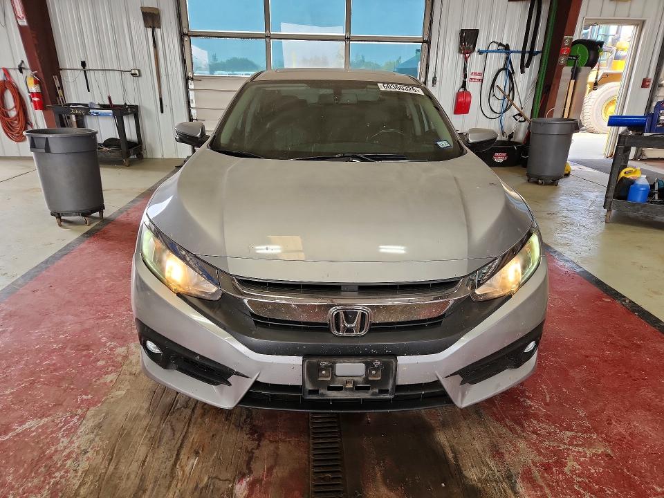 Photo 5 from auction – 2016 HONDA CIVIC with VIN 2HGFC1F74GH635922