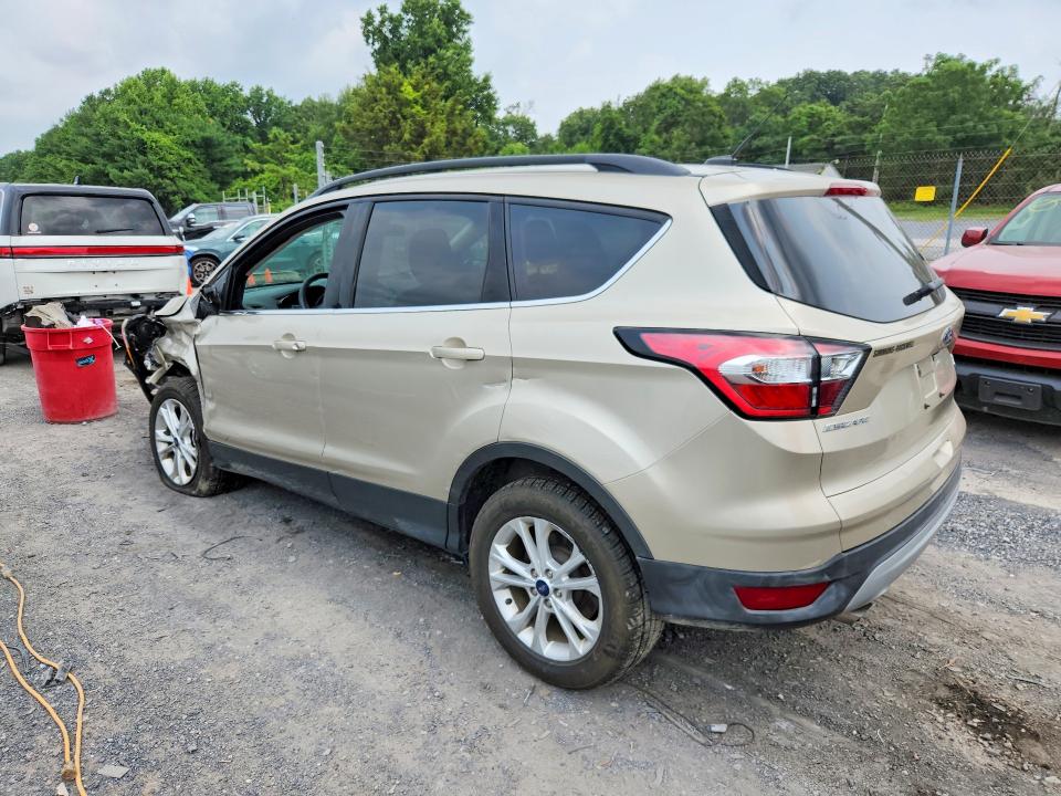 Photo 2 from auction – 2018 FORD ESCAPE with VIN 1FMCU9GD4JUD25416