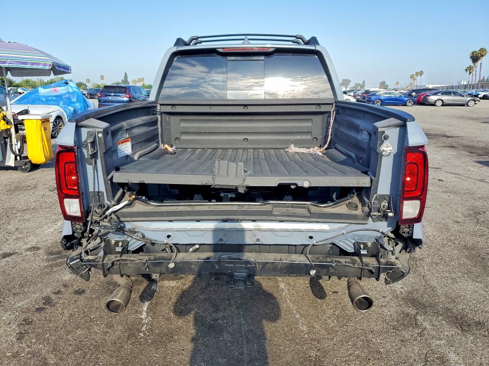 Photo 6 from auction – 2023 HONDA RIDGELINE with VIN 5FPYK3F51PB061698