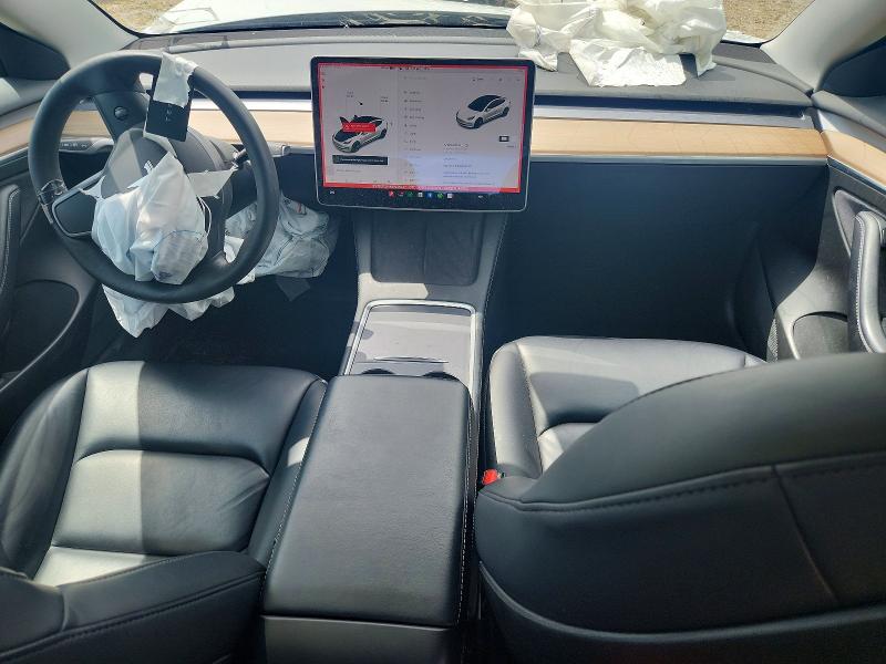 Photo 8 from auction – 2021 TESLA MODEL 3 with VIN 5YJ3E1EB4MF051037