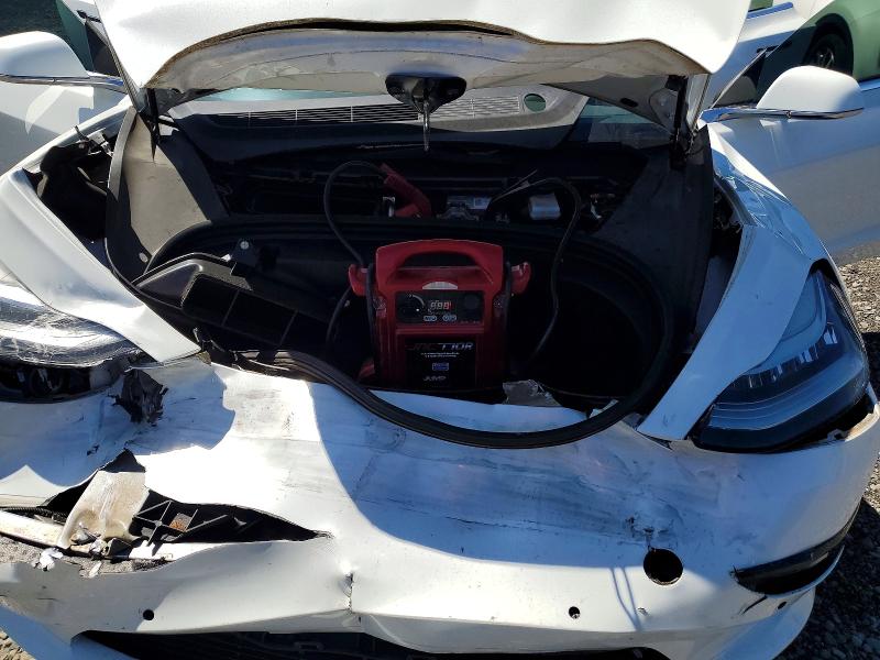 Photo 11 from auction – 2020 TESLA MODEL 3 with VIN 5YJ3E1EB2LF669004
