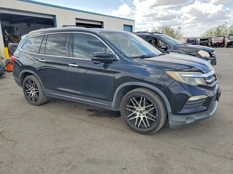 Photo 4 from auction – 2016 HONDA PILOT with VIN 5FNYF5H93GB014195
