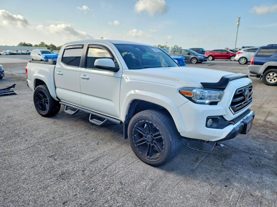 Photo 4 from auction – 2018 TOYOTA TACOMA with VIN 3TMAZ5CN9JM075552