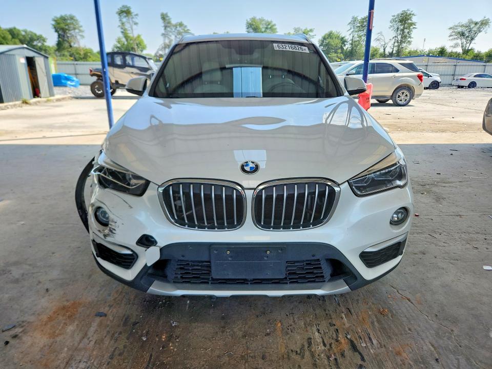 Photo 5 from auction – 2016 BMW X1 with VIN WBXHT3C34G5E56474