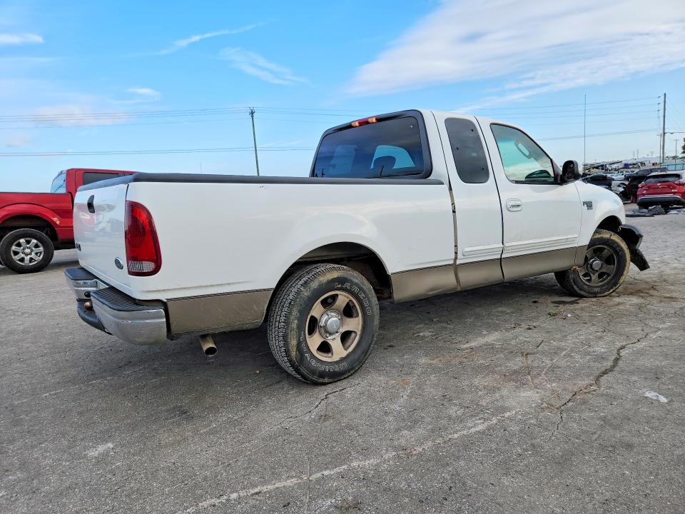 Photo 3 from auction – 2002 FORD F150 with VIN 1FTRX17WX2NB27282