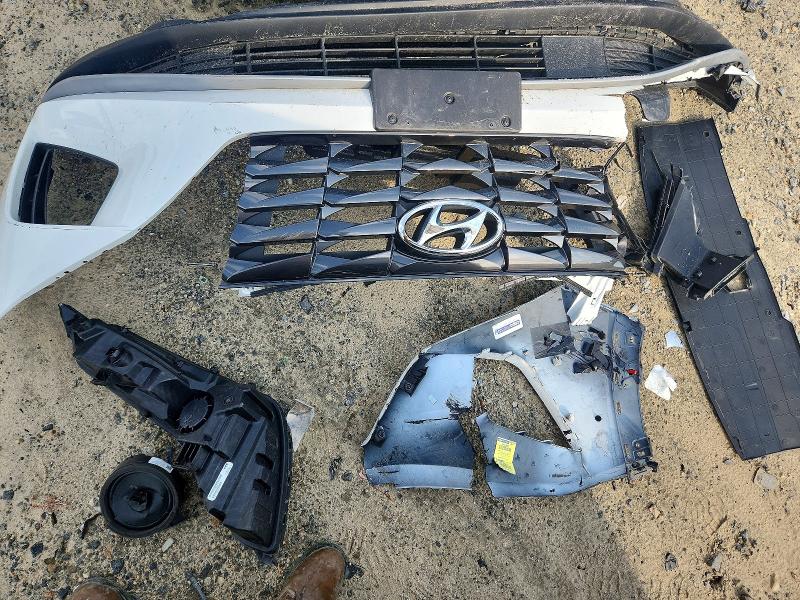 Photo 13 from auction – 2023 HYUNDAI TUCSON with VIN 5NMJACAE5PH255671