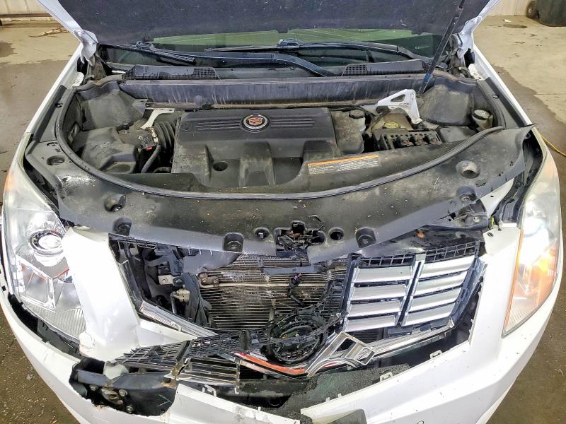 Photo 11 from auction – 2015 CADILLAC SRX with VIN 3GYFNEE33FS562093