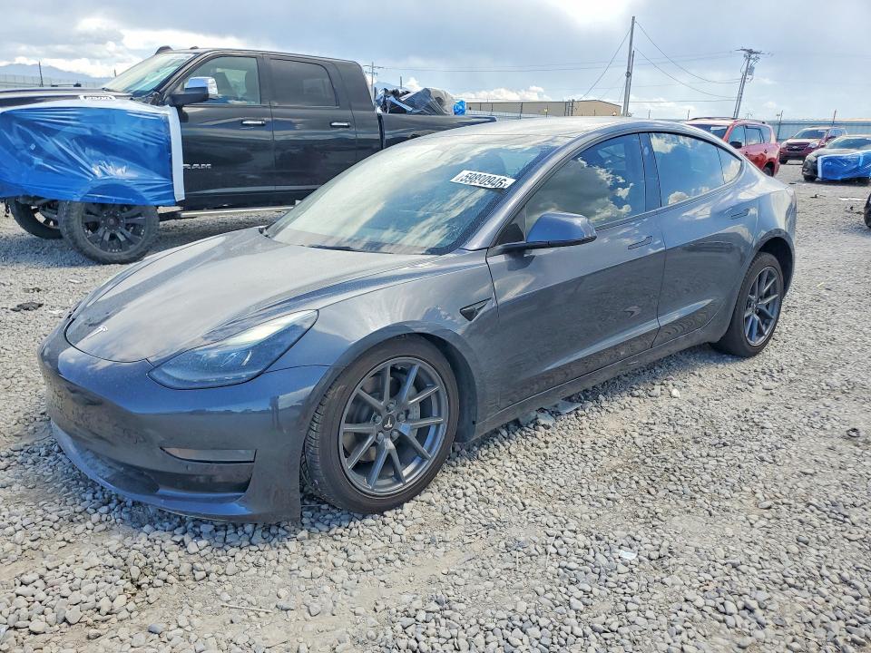 TESLA MODEL 3 2022 with VIN 5YJ3E1EA0NF194415 - Photo from auction