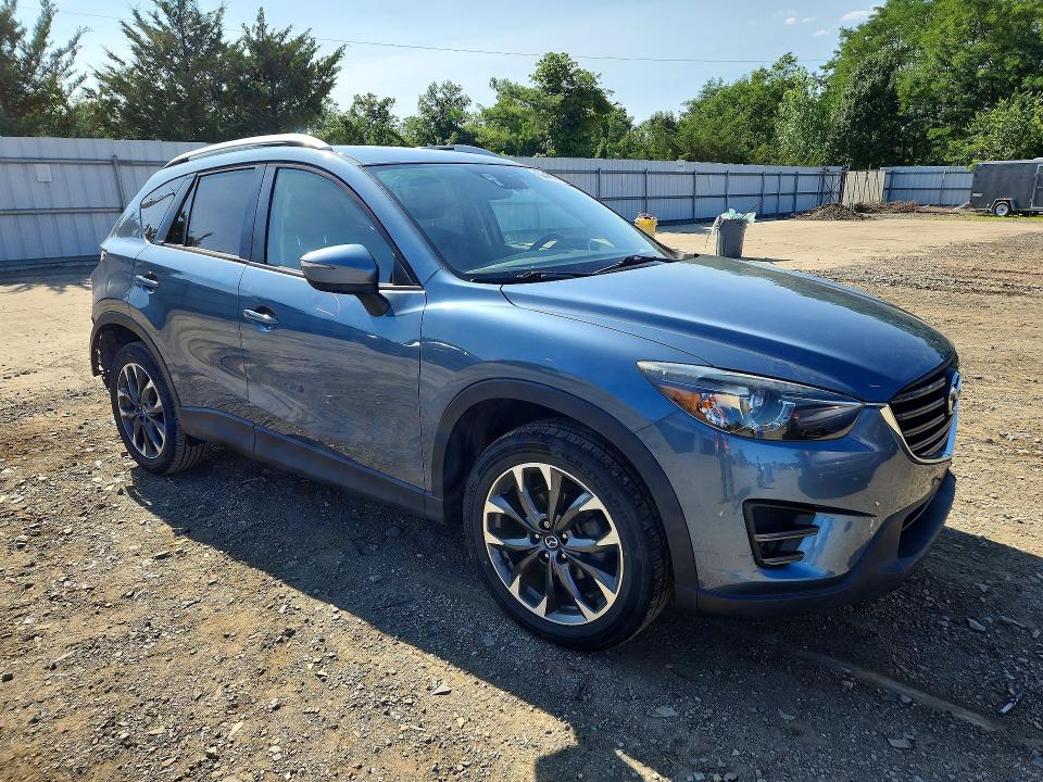 Foto 4 de la subasta – 2016 MAZDA CX-5 con VIN JM3KE4DY1G0838461