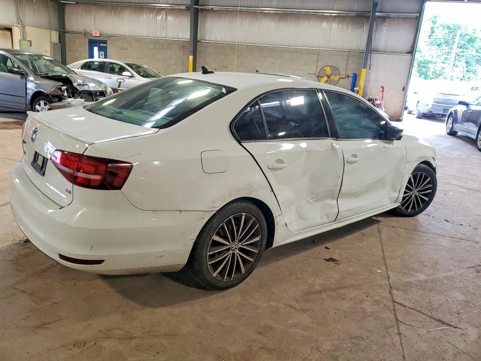 Photo 3 from auction – 2016 VOLKSWAGEN JETTA with VIN 3VWD17AJ6GM349943