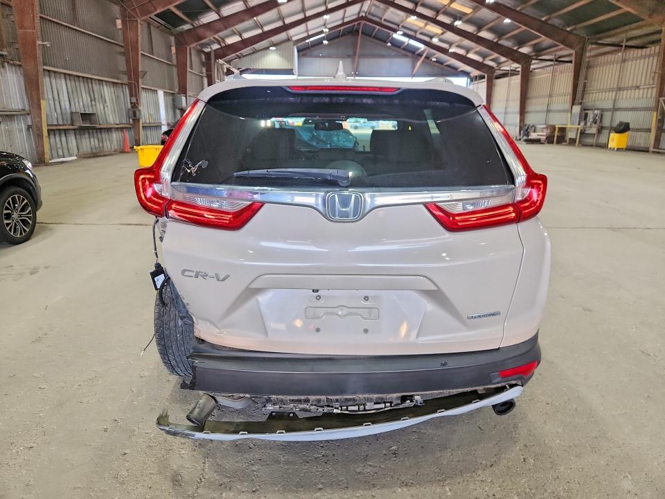 Снимка 6 от търг – 2017 HONDA CR-V с VIN 5J6RW1H90HL016461