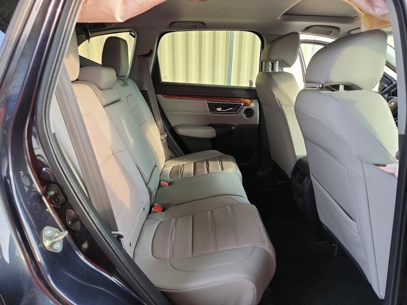 Photo 11 from auction – 2017 HONDA CR-V with VIN 7FARW1H87HE018597
