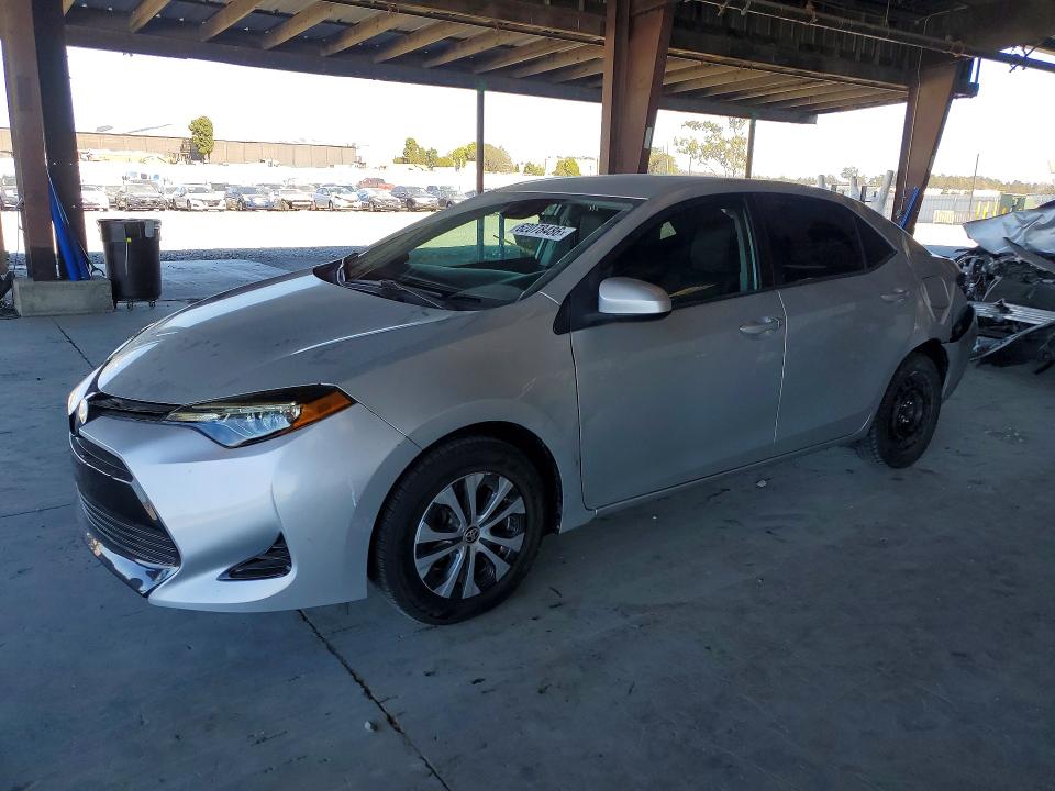 TOYOTA COROLLA 2019 with VIN 5YFBURHE3KP863336 - Photo from auction