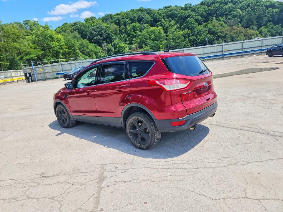 Photo 2 from auction – 2016 FORD ESCAPE with VIN 1FMCU9GX6GUC33193