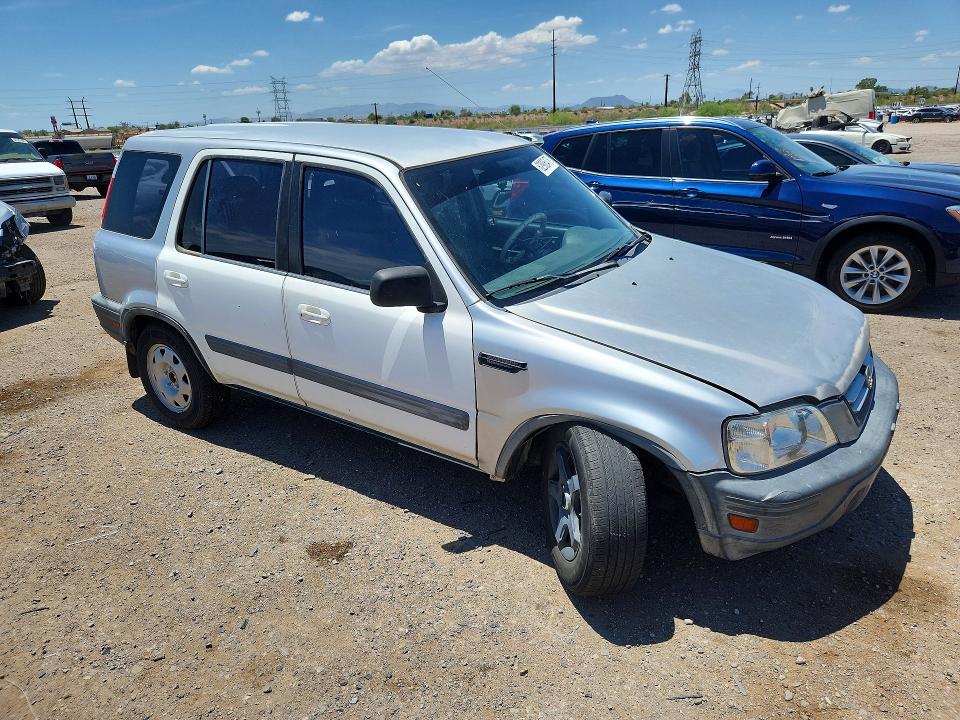 Photo 4 from auction – 1999 HONDA CR-V with VIN JHLRD2842XC007171