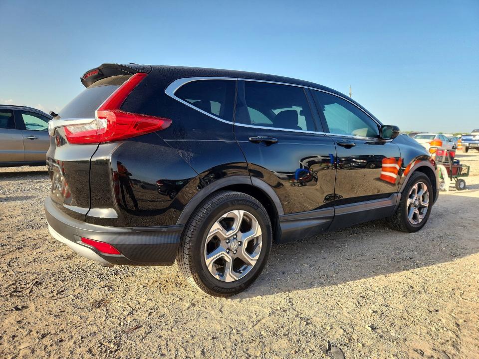 Photo 3 from auction – 2018 HONDA CR-V with VIN 7FARW1H83JE017839