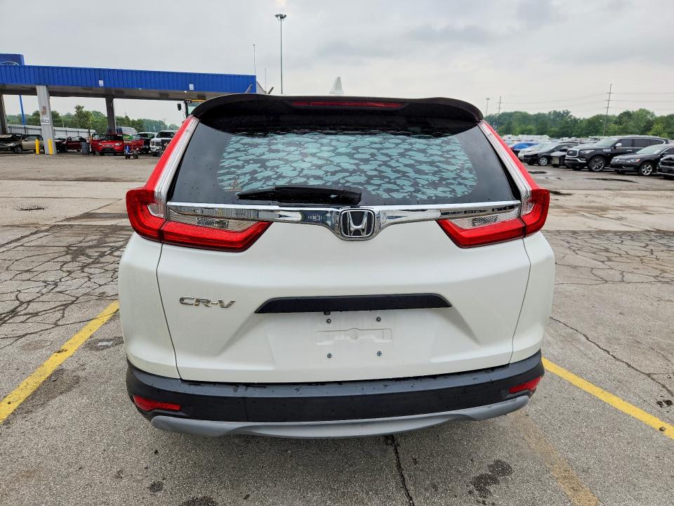 Photo 6 from auction – 2017 HONDA CR-V with VIN 5J6RW5H34HL002744