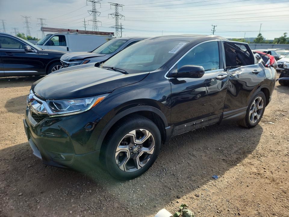 HONDA CR-V 2018 with VIN 7FARW2H81JE006571 - Photo from auction