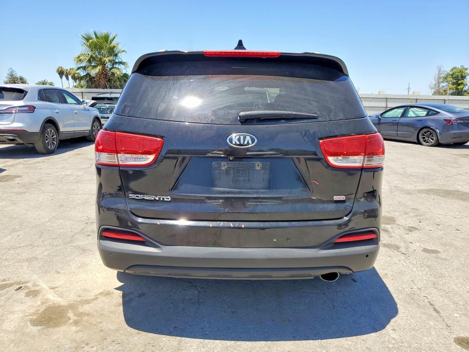 Photo 6 from auction – 2016 KIA SORENTO with VIN 5XYPG4A36GG140777