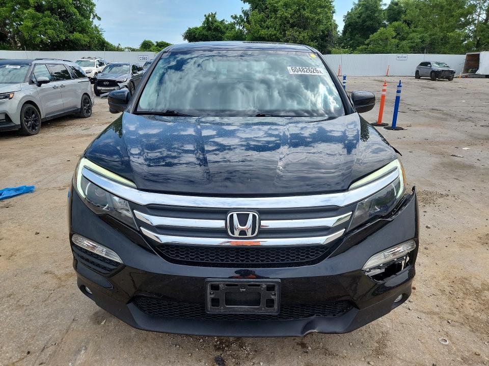Photo 5 from auction – 2016 HONDA PILOT with VIN 5FNYF6H76GB019735