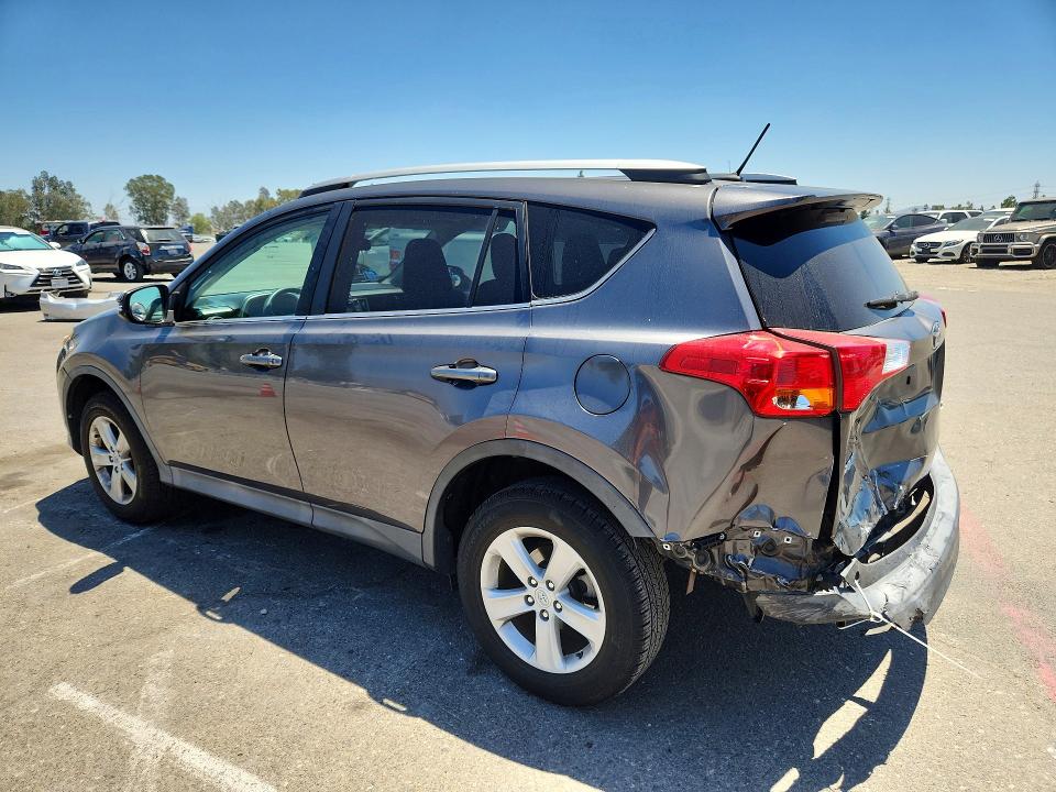 Photo 2 from auction – 2014 TOYOTA RAV4 with VIN 2T3WFREV6EW115058