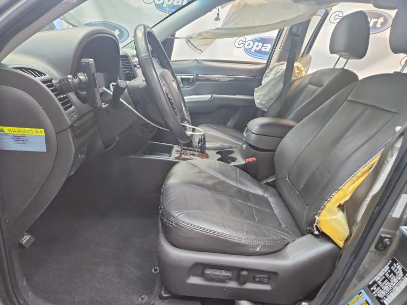 Photo 7 from auction – 2011 HYUNDAI SANTA FE with VIN 5XYZK4AG9BG034679