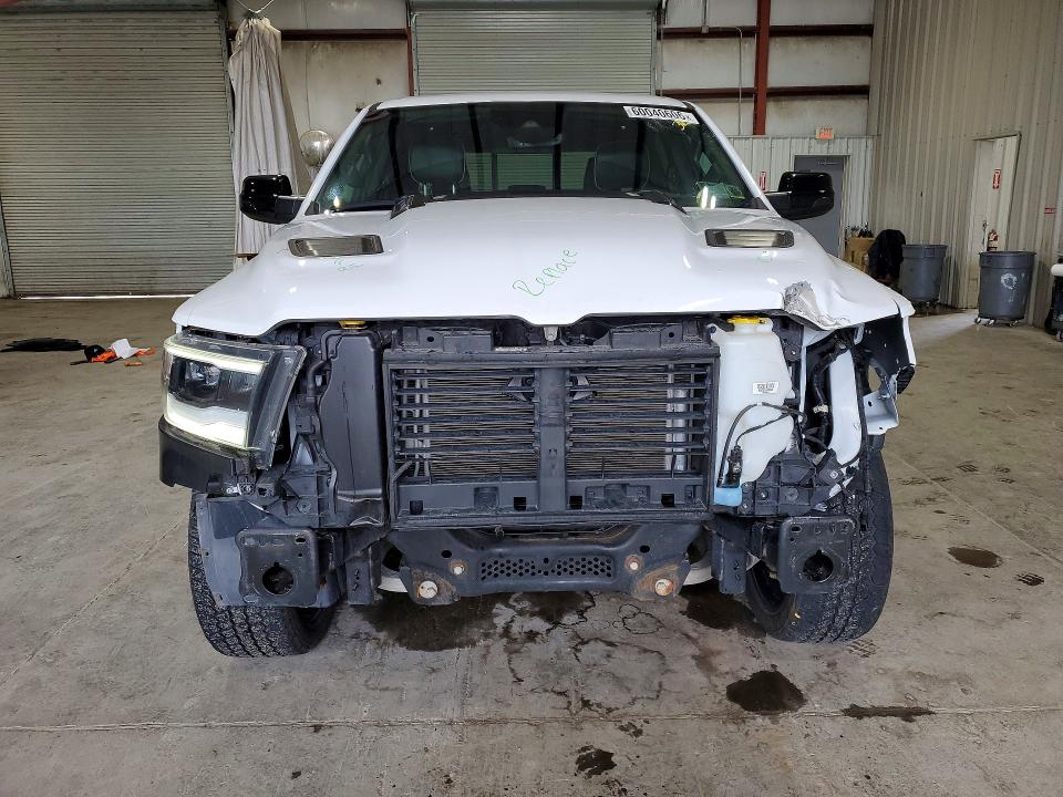 Photo 5 from auction – 2021 RAM 1500 with VIN 1C6SRFJT5MN657564