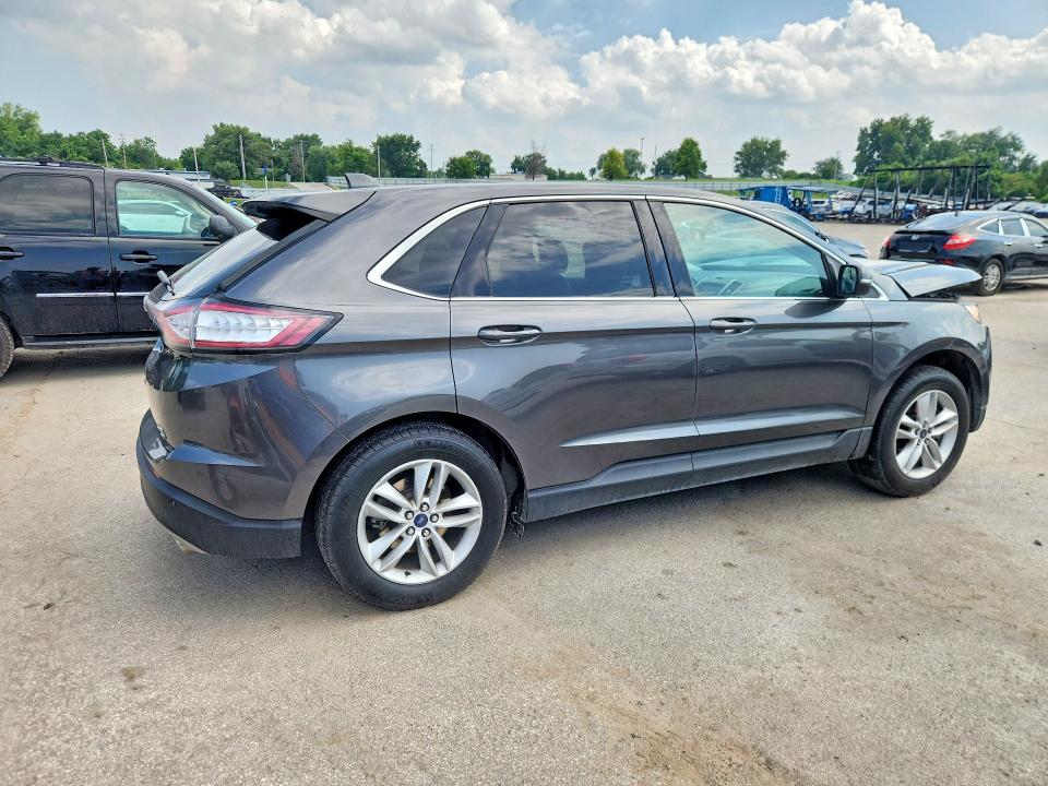 Photo 3 from auction – 2015 FORD EDGE with VIN 2FMTK4J86FBC11709