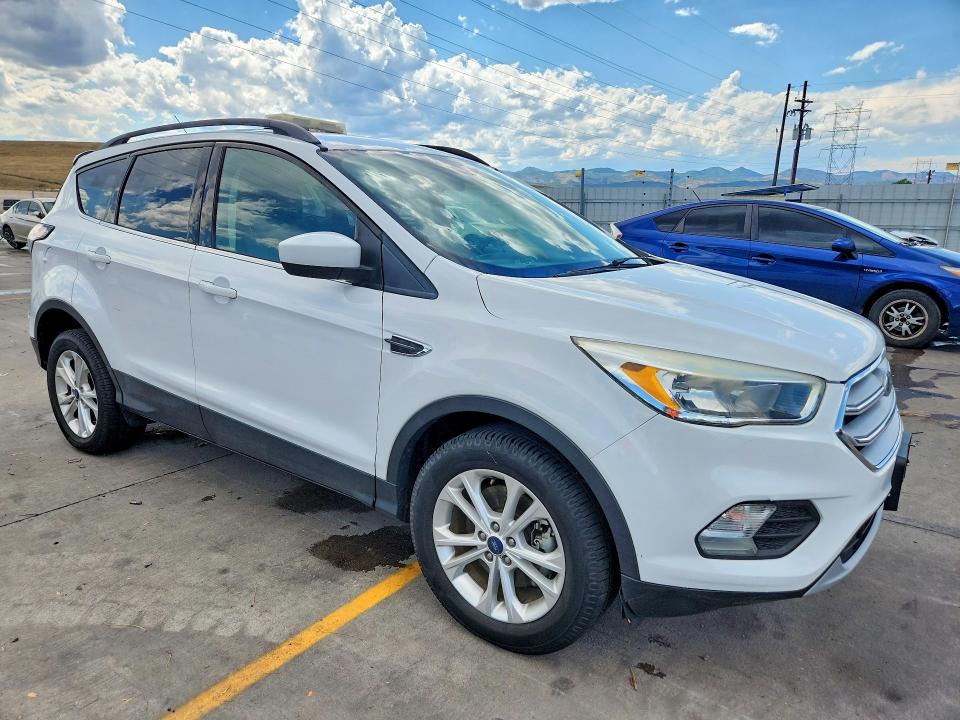 Photo 4 from auction – 2018 FORD ESCAPE with VIN 1FMCU9GD0JUA97527