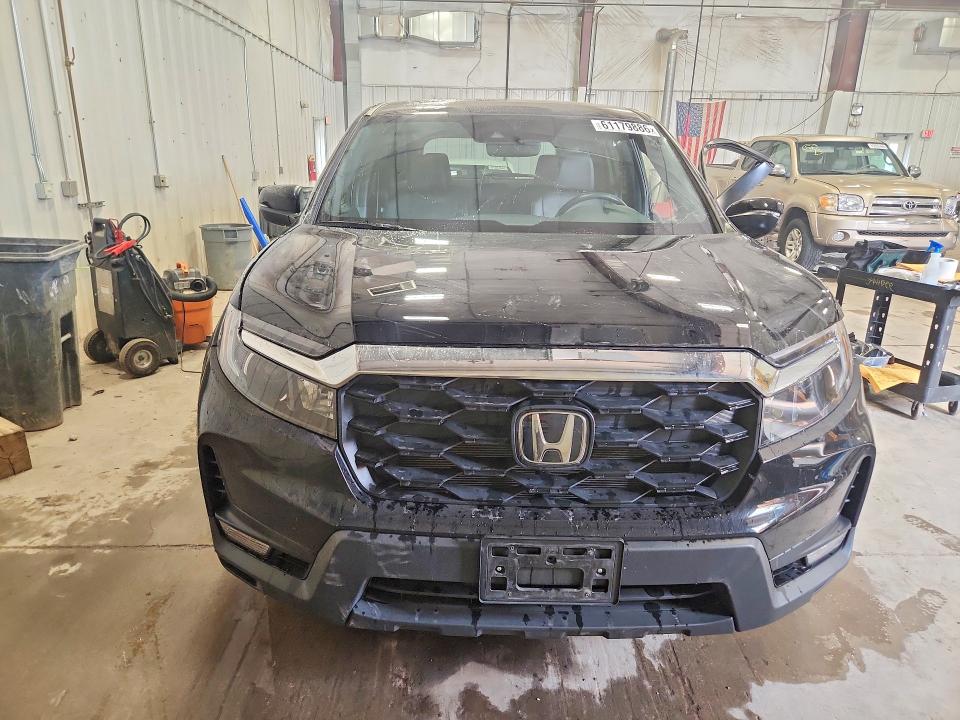 Photo 5 from auction – 2023 HONDA PASSPORT with VIN 5FNYF8H50PB033012