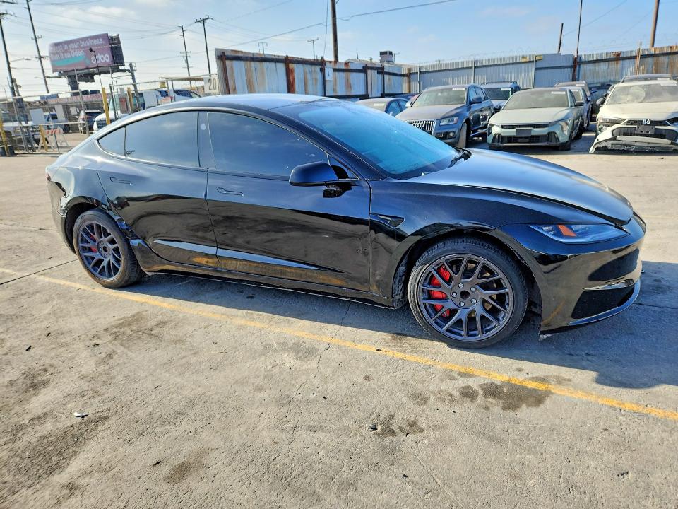 Photo 4 from auction – 2025 TESLA MODEL 3 with VIN 5YJ3E1EA3SF980608