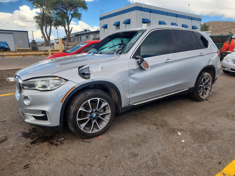 BMW X5 2018 with VIN 5UXKR0C53J0X88746 - Photo from auction