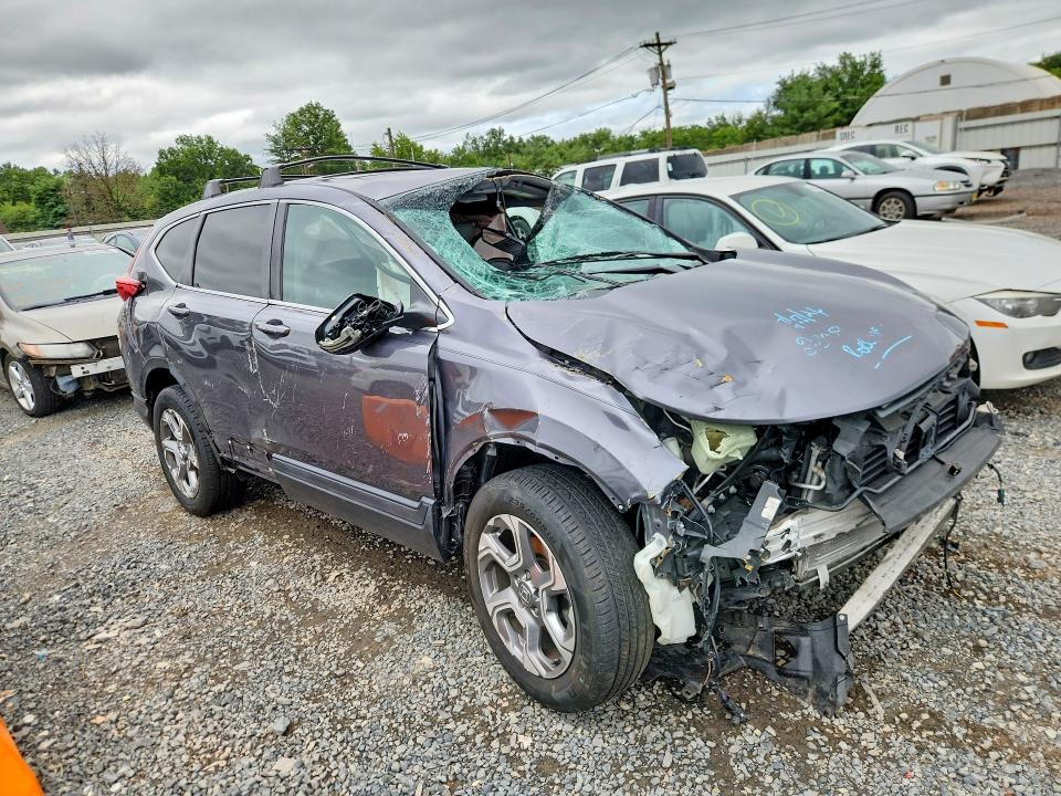 Photo 4 from auction – 2018 HONDA CR-V with VIN 2HKRW2H82JH641053