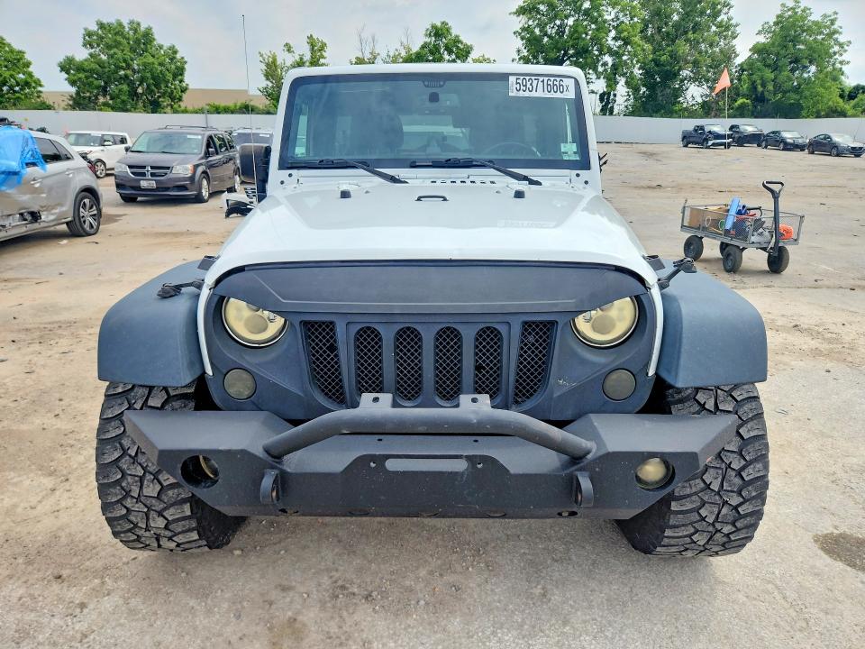 Снимка 5 от търг – 2016 JEEP WRANGLER UNLIMITED с VIN 1C4BJWDG6GL315555