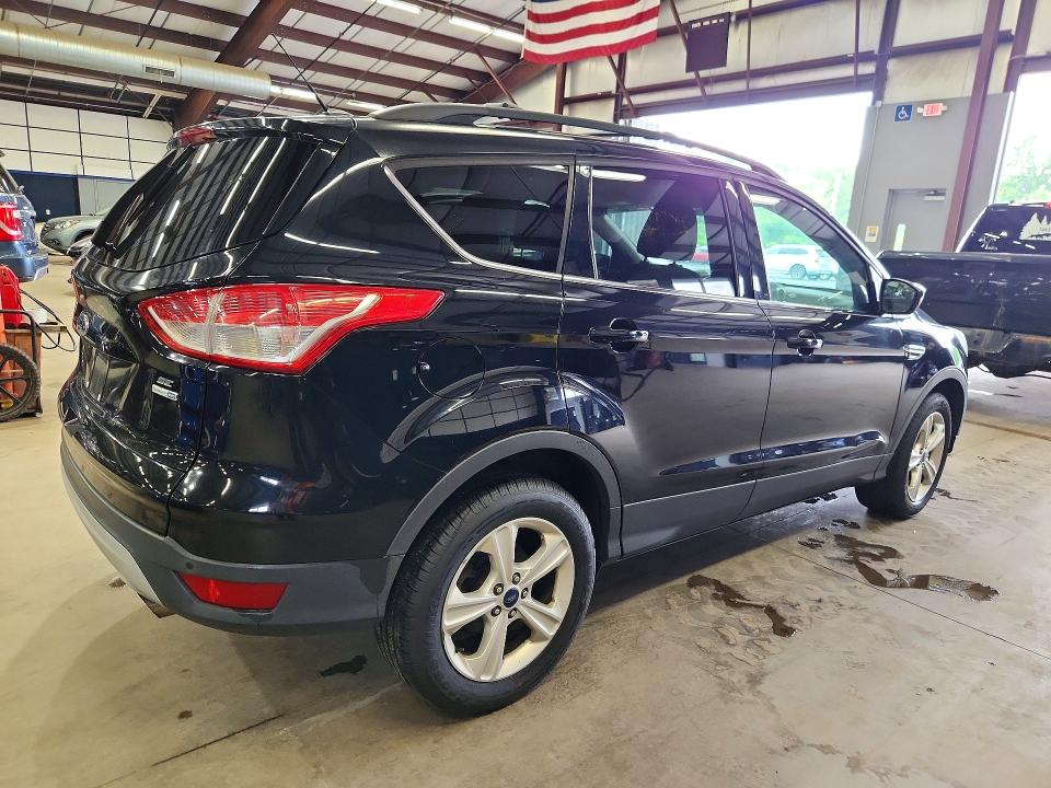 Photo 3 from auction – 2016 FORD ESCAPE with VIN 1FMCU9GX5GUA41568