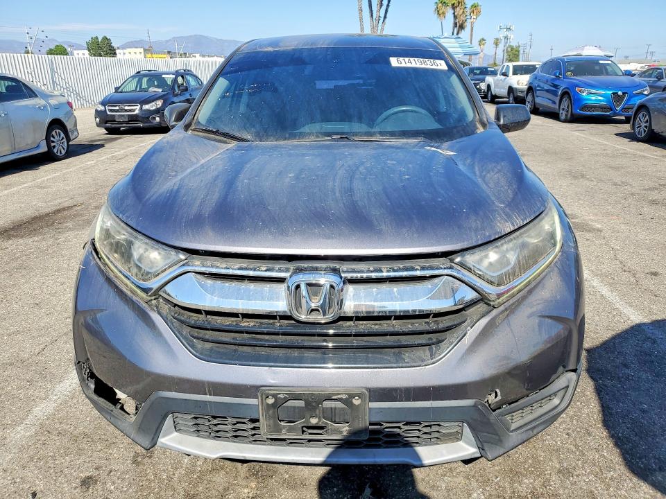 Photo 5 from auction – 2019 HONDA CR-V with VIN 5J6RW5H34KL001567