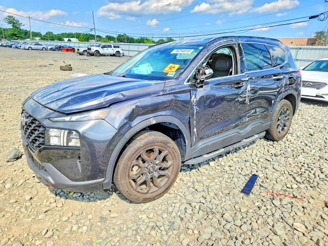 HYUNDAI SANTA FE 2023 with VIN 5NMS6DAJ1PH624826 - Photo from auction