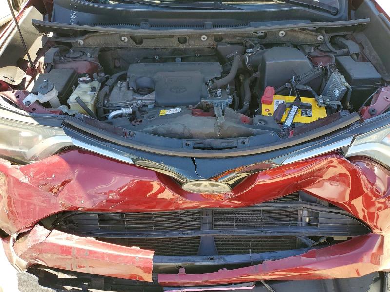 Photo 12 from auction – 2018 TOYOTA RAV4 with VIN JTMZFREV8JD109556