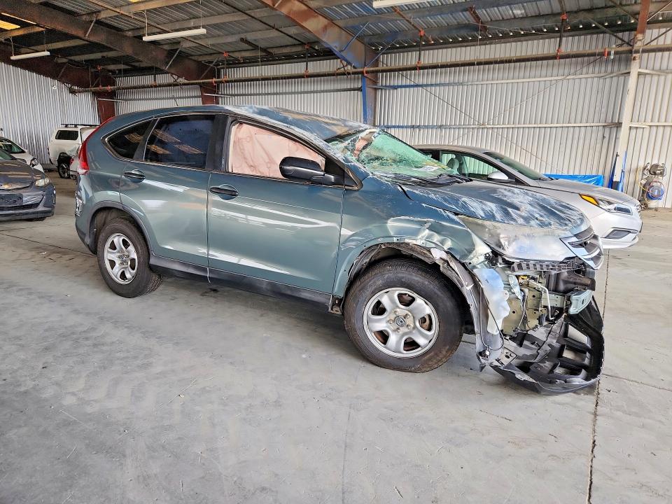 Photo 4 from auction – 2012 HONDA CR-V with VIN 2HKRM3H3XCH508382
