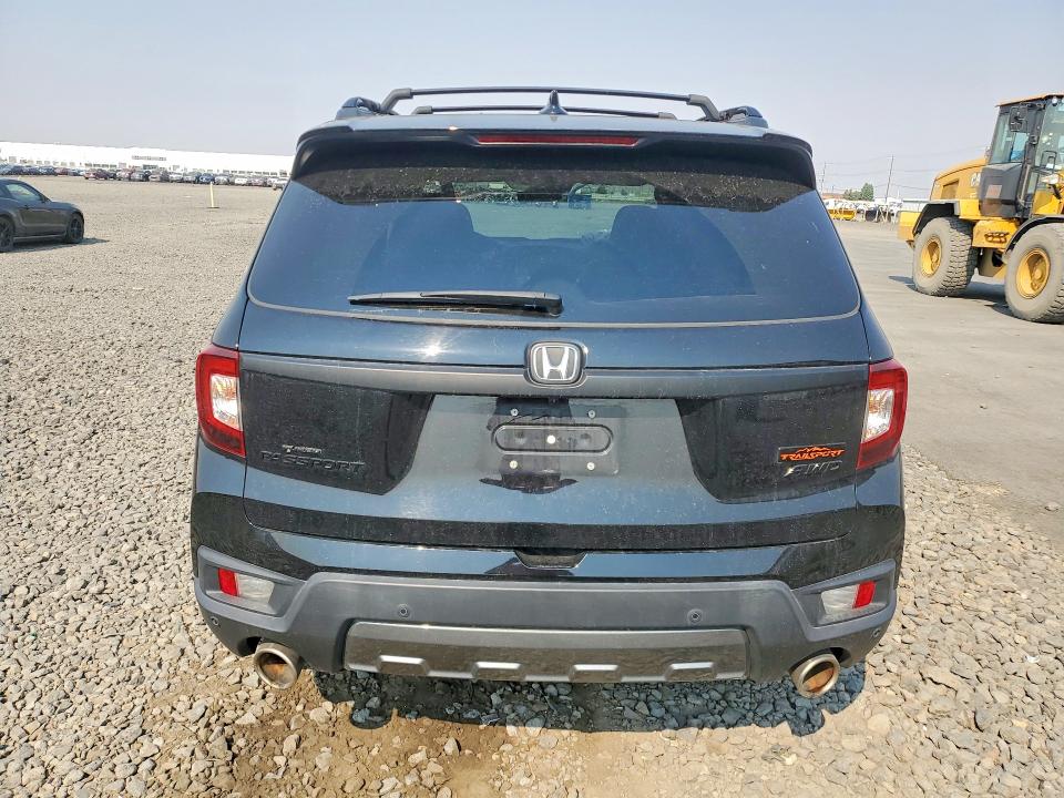 Photo 6 from auction – 2022 HONDA PASSPORT with VIN 5FNYF8H65NB014008
