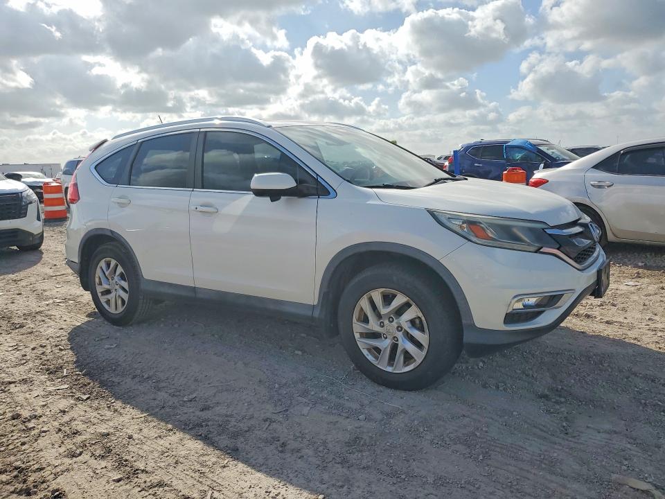 Photo 4 from auction – 2015 HONDA CR-V with VIN 5J6RM4H79FL091629