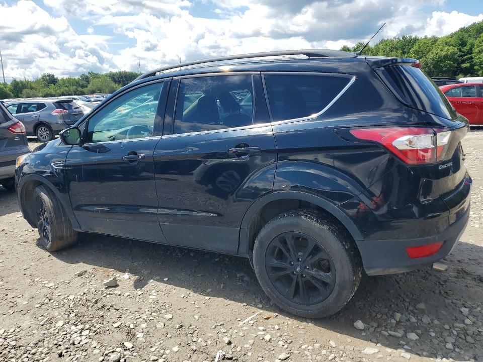 Photo 2 from auction – 2018 FORD ESCAPE with VIN 1FMCU9GD2JUB01528