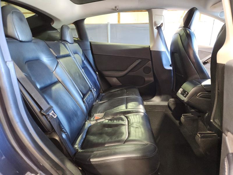 Photo 11 from auction – 2022 TESLA MODEL Y with VIN 7SAYGDEE0NF386103